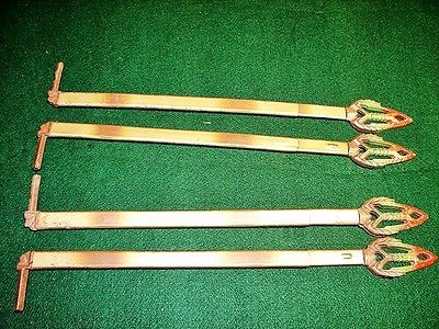   listed LOT OF FOUR ANTIQUE SWING ARM RETRACTABLE CURTAIN BRACKETS