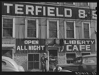 Side of tobacco warehouse showing sign of all night caf.? Durham,North 