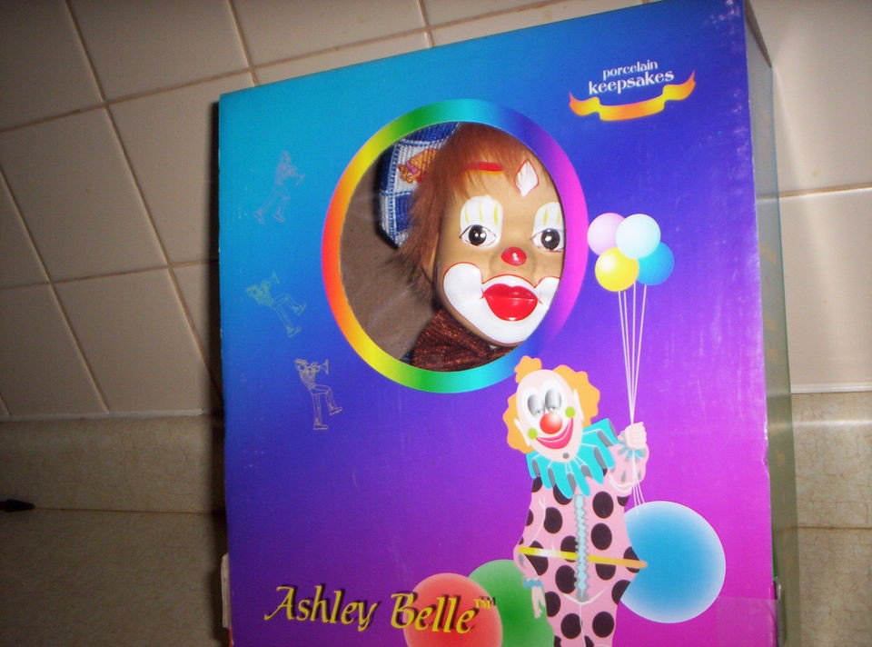 ASHLEY BELLE PORCELAIN CLOWN DOLL ON SWING MINT IN BOX