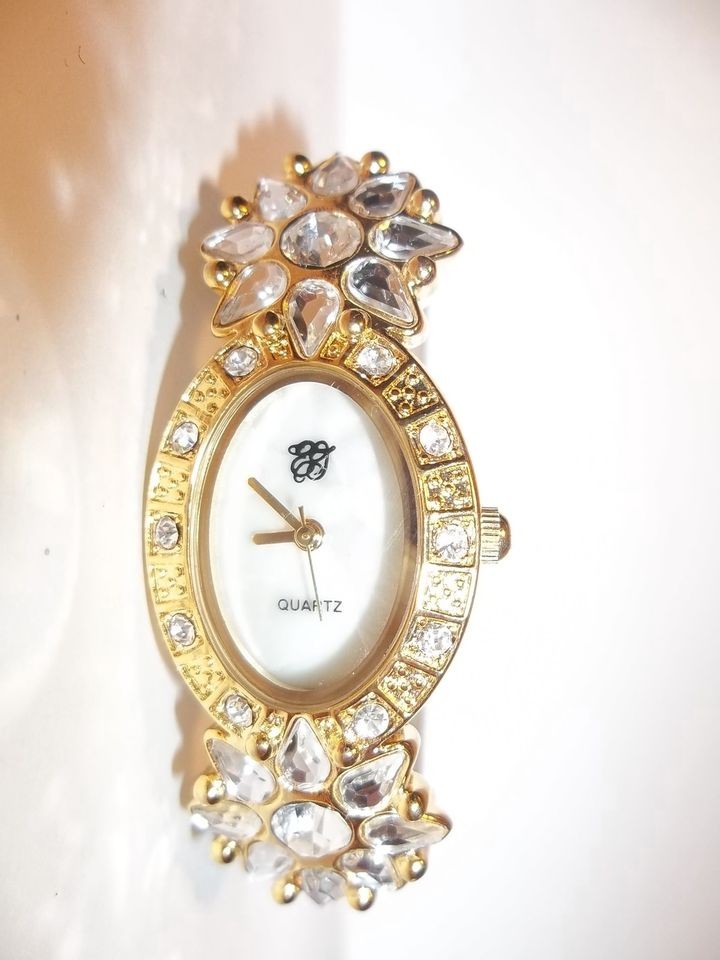 ELIZABETH TAYLOR ## RUNS GREAT ## WHITE DIAMONDS ANNIVERSARY WATCH w 