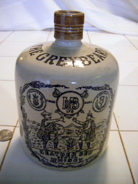 1934 stoneware whiskey jug The Greybeard Whisky Full paper label 