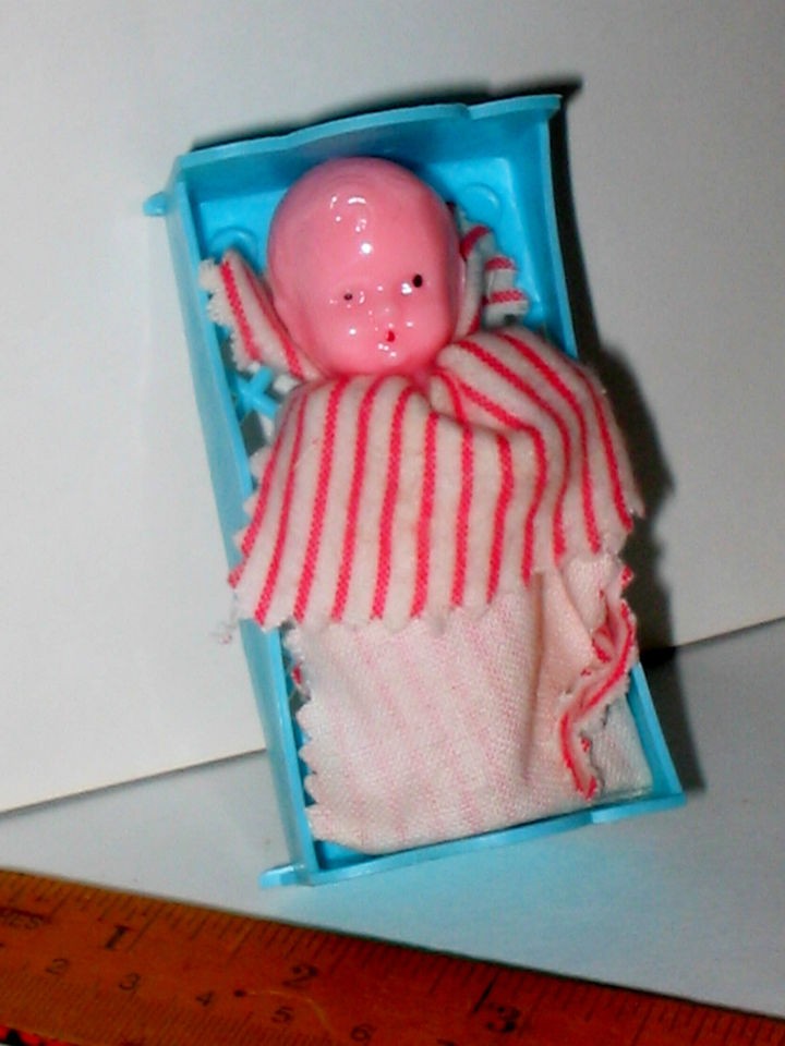 Vintage PLASTIC CELLULOID MINIATURE Baby Doll in Crib Dollhouse Size