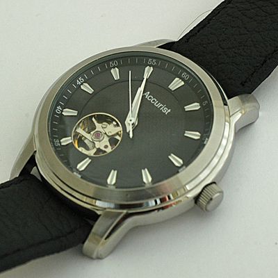 All photographs are of the actual watch offered for sale.