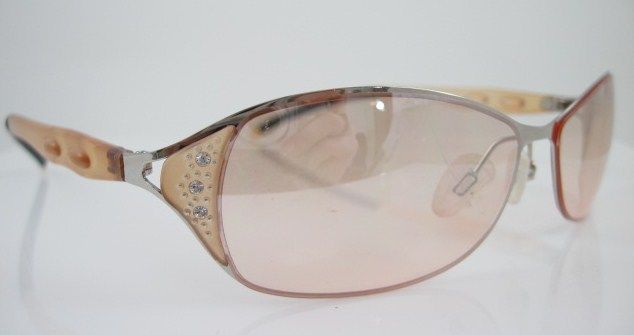 you are bidding on a pair of batali tan frameless rhinestone 