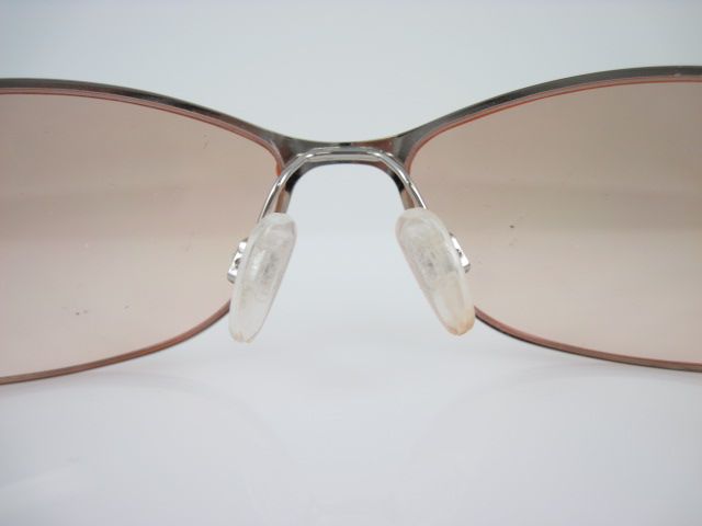 you are bidding on a pair of batali tan frameless rhinestone 