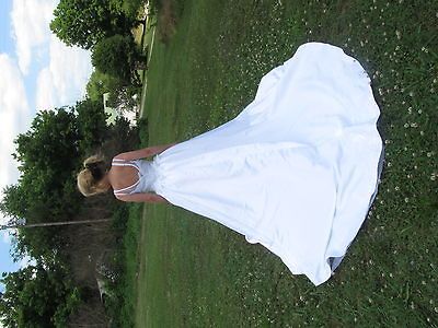 Stunning White Casablanca Bridal Gown with Long Detachable Train