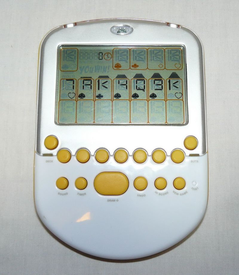 Radica Handheld Big Screen Solitaire Electronic Game White Yellow