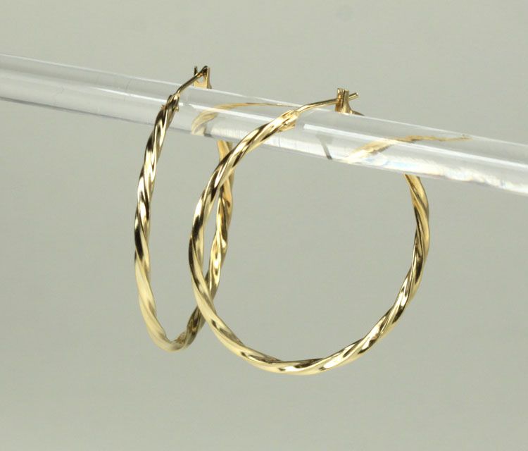 adds extra sparkle to these stylish big hoop earrings they are stamped