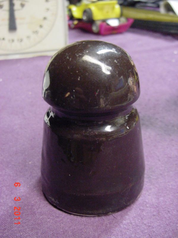 Small Dark Brown Ceramic Insulator