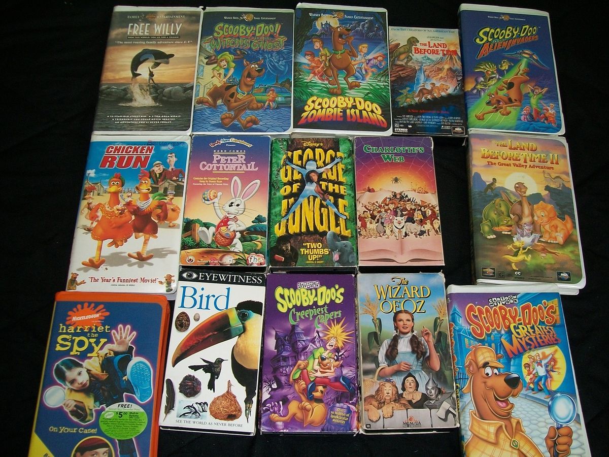 Lot of childrens vhs tapes scooby doo, land before time, chicken run