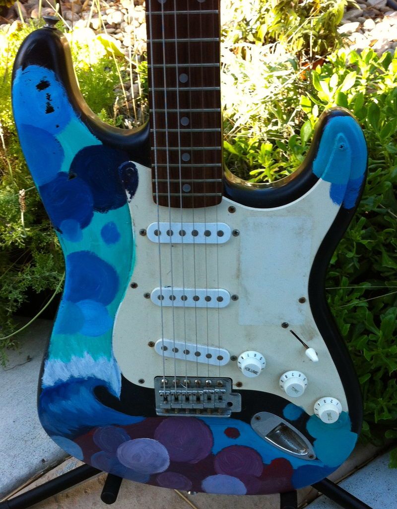 OLDER FENDER SQUIER STRATOCASTER W/BAD PAINT JOB