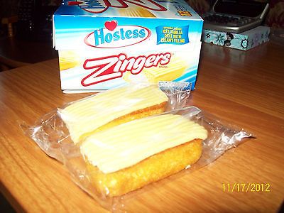 HOSTESS ZINGER   ICED VANILLA CAKE WITH CREAMY FROSTING