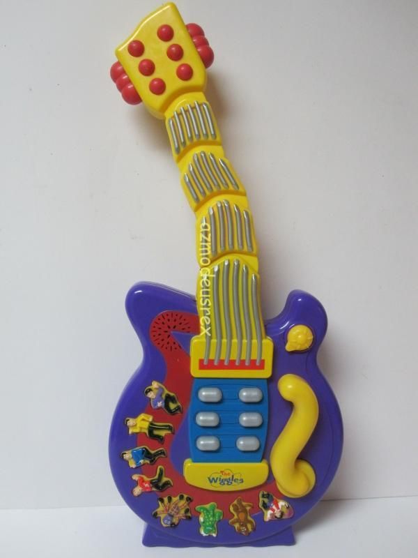 Wiggles Singing Musical Dancing Purple Wiggly Toy Guitar by Spinmaster ...