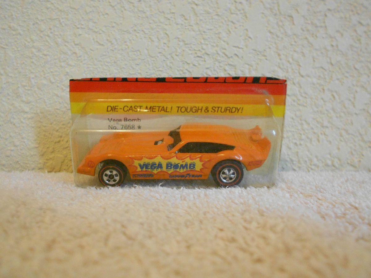 1969 Redline Hot Wheels Vega Bomb Flying Colors Unopened Hong Kong